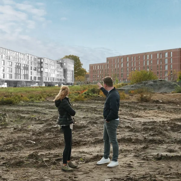 FRANK-Mitarbeitende auf einer Baustelle mit Projektentwurf